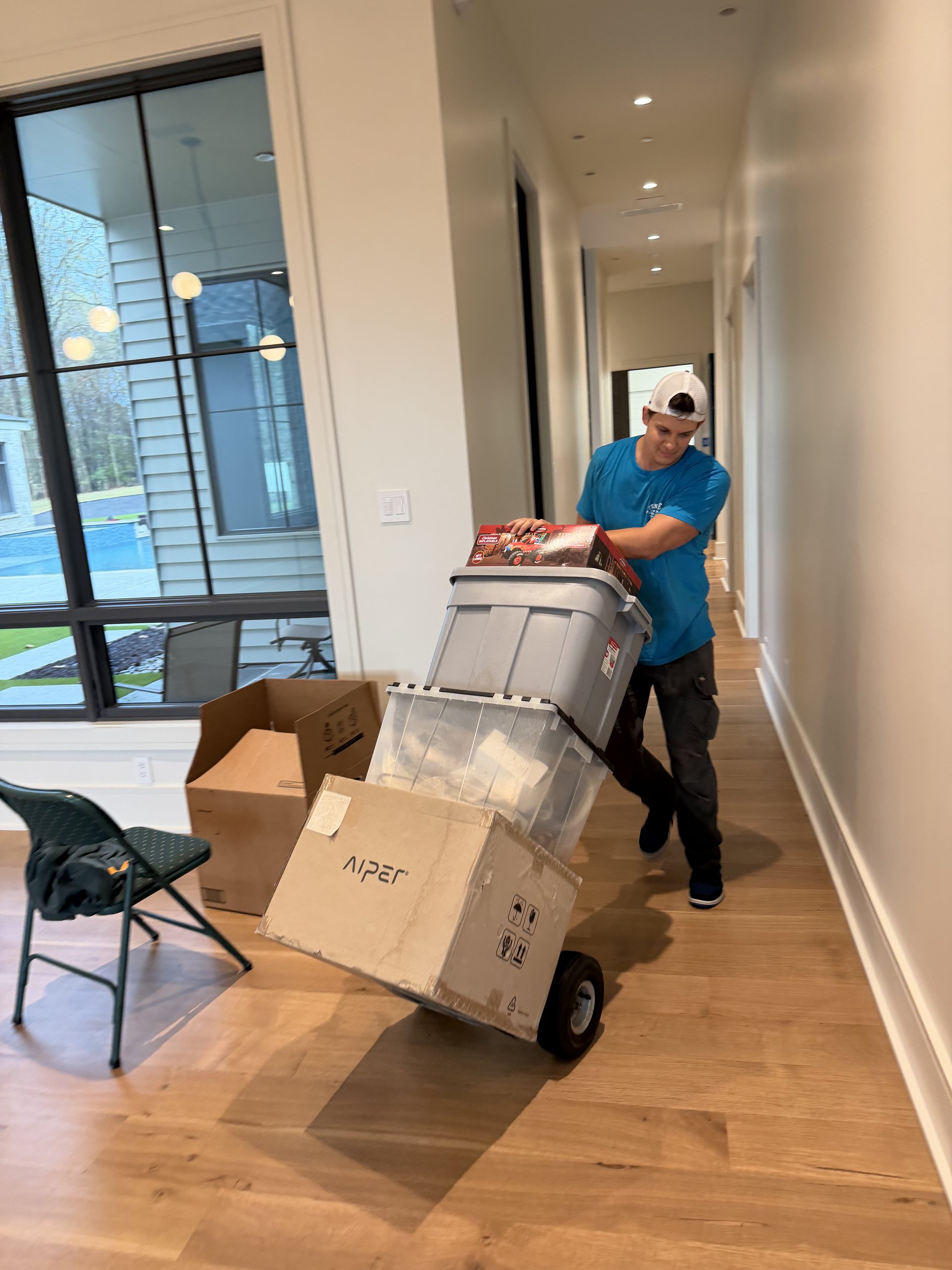 Titan Elite movers carefully handling a customer’s belongings
